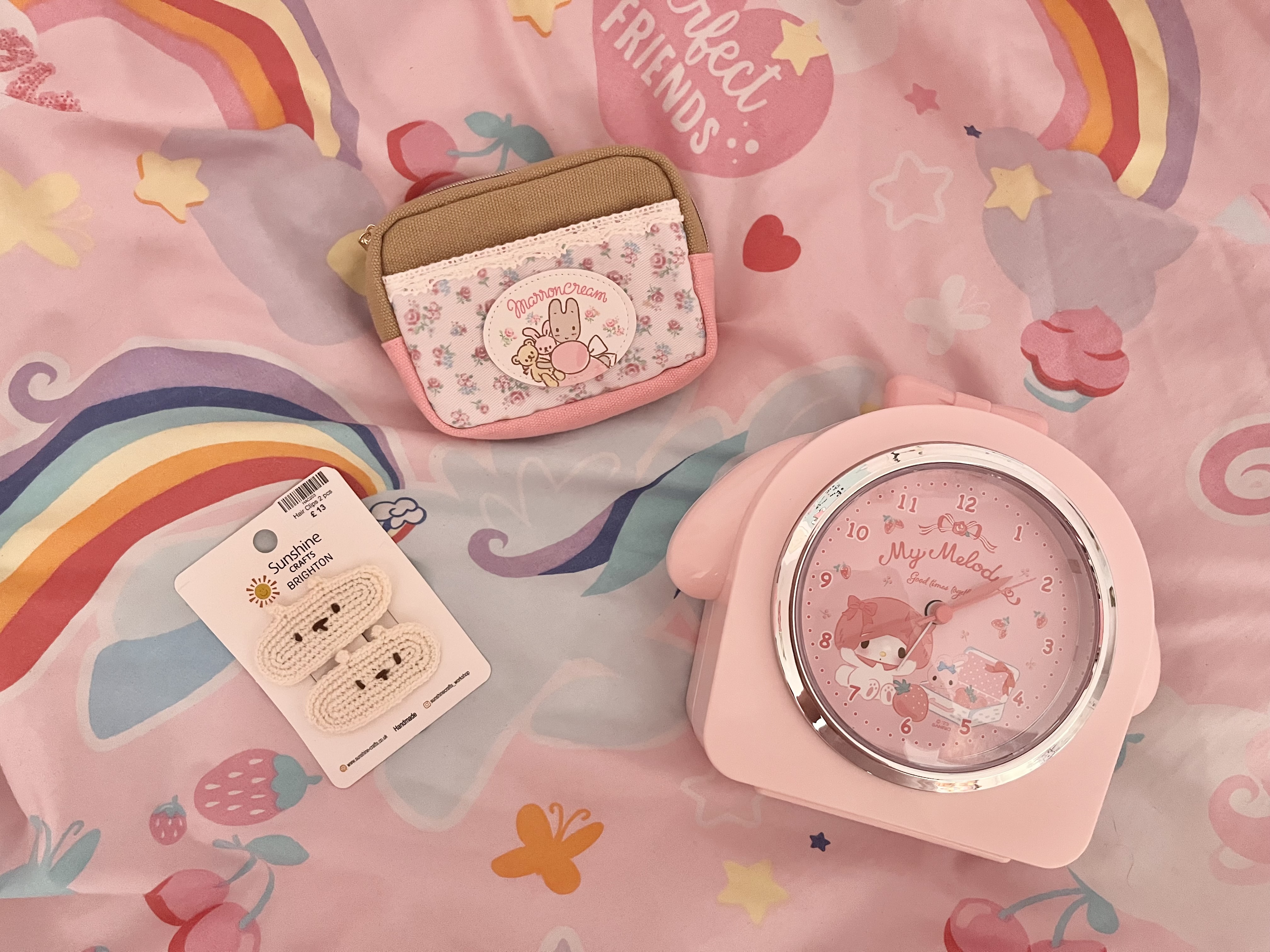 a clock, hairclips and a purse