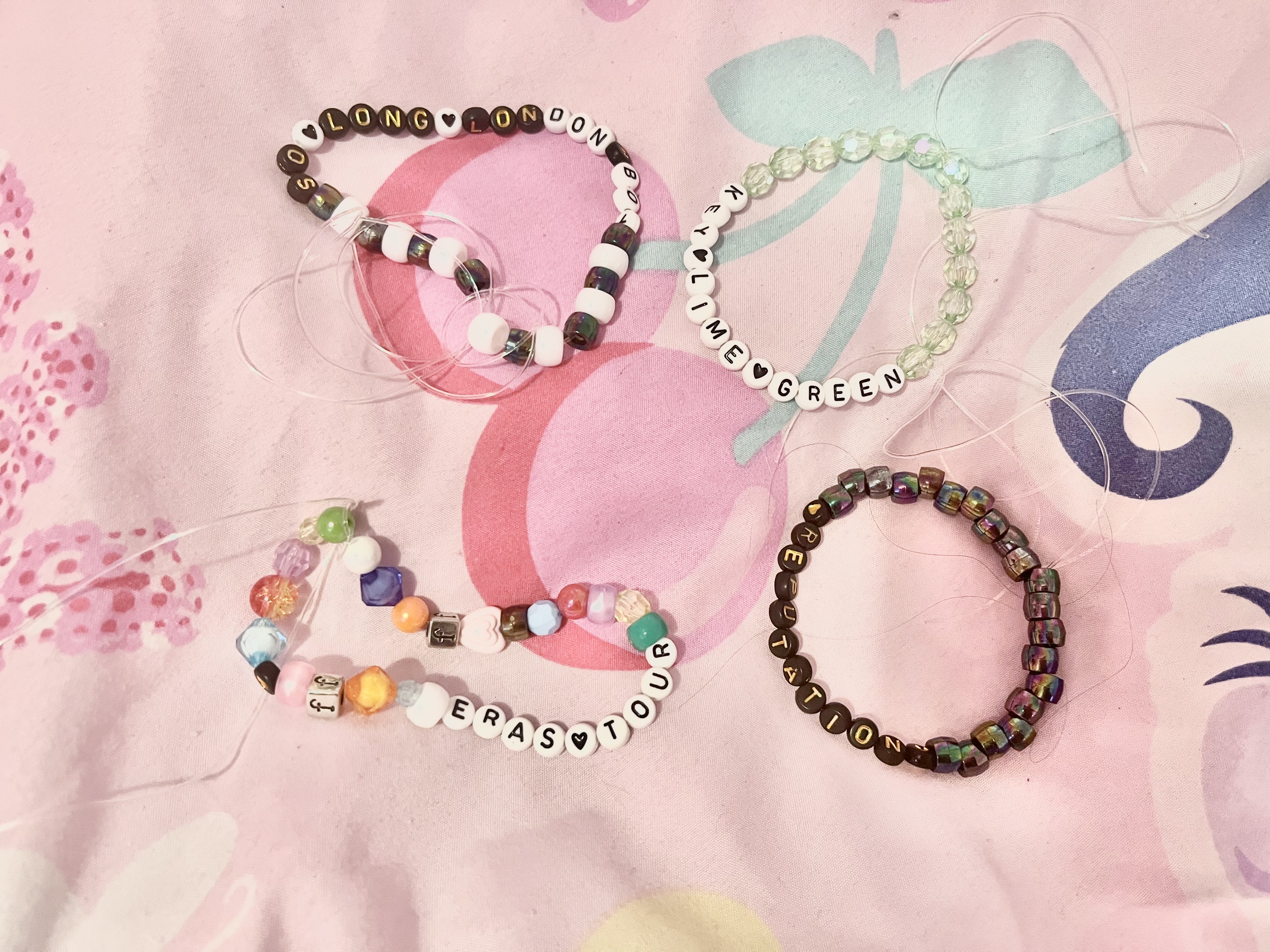 a bunch of kandi bracelets