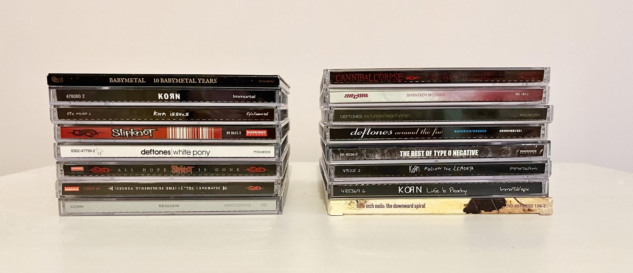 cds from different bands and artists such as; babymetal, korn, slipknot, deftones, cannibal corpse, the cure, type o negitive and nine inch nails