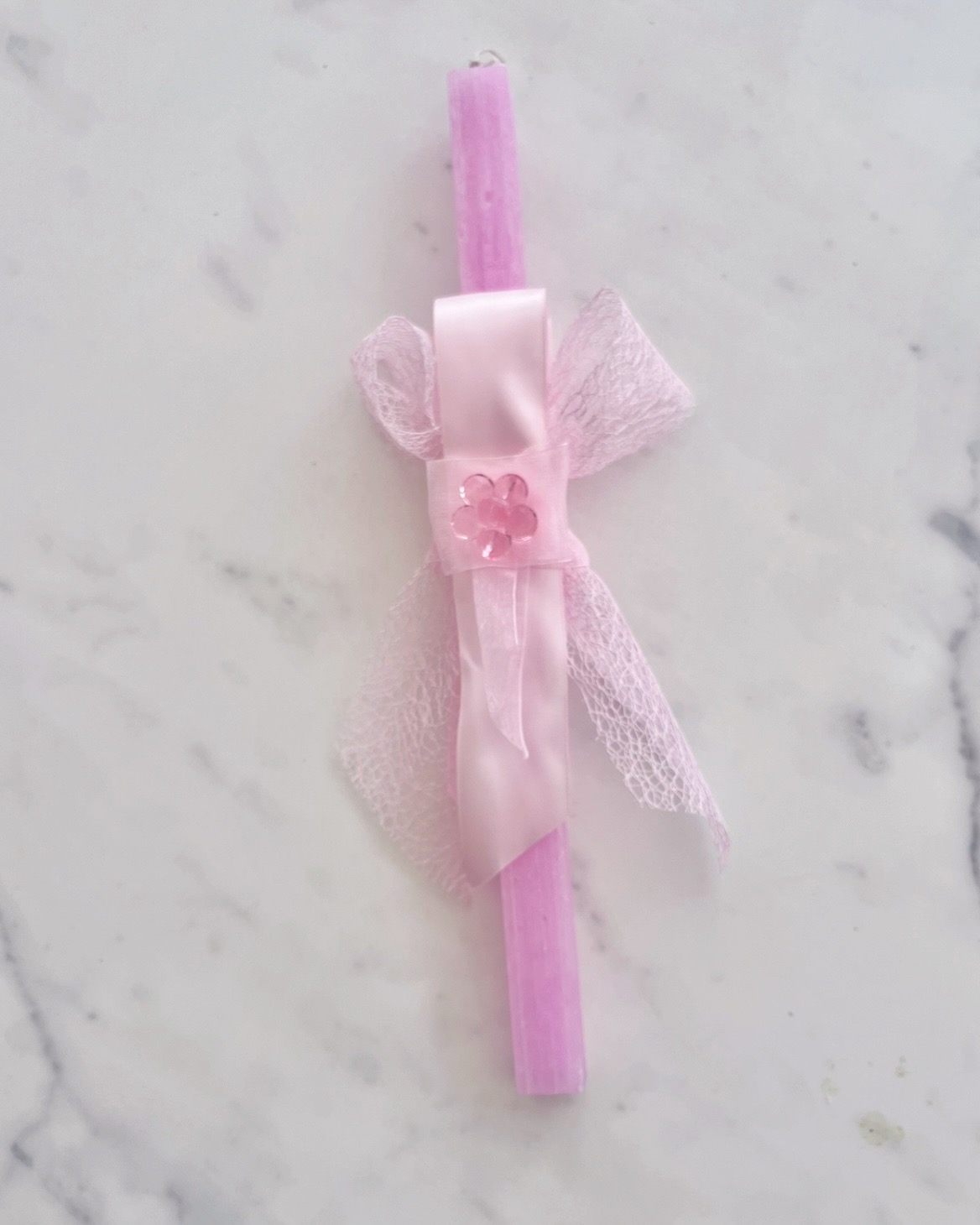 a pink paschal candle